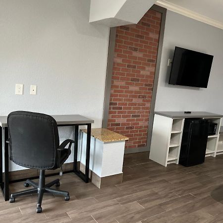The Symphony Inn & Suites Хюстън Екстериор снимка