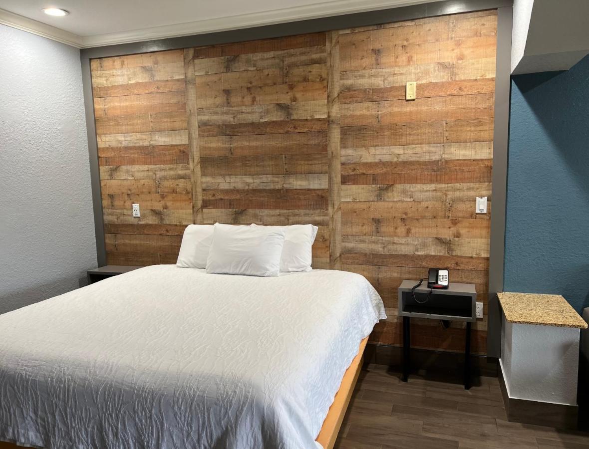 The Symphony Inn & Suites Хюстън Екстериор снимка