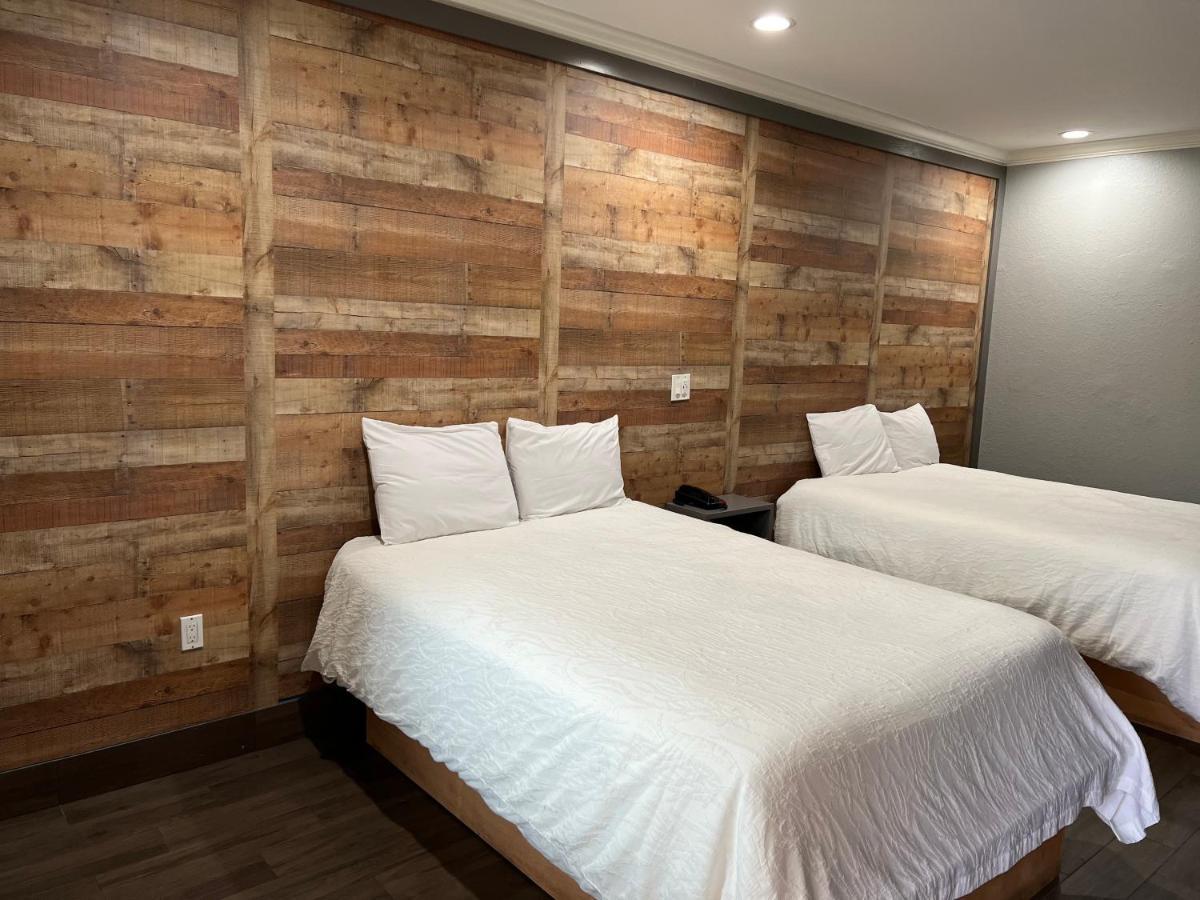 The Symphony Inn & Suites Хюстън Екстериор снимка